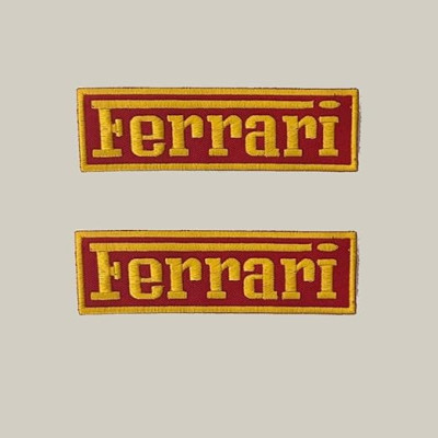 N.2 Toppe Scritta Ferrari